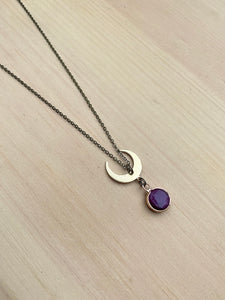 Ruby and brass moon necklace