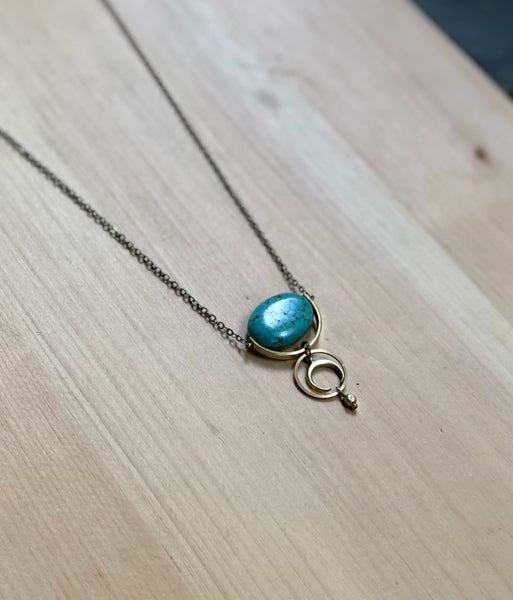 Turquoise and brass moon necklace