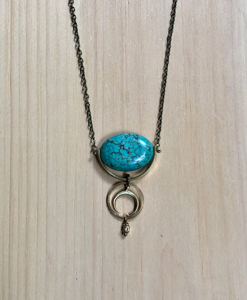 Turquoise and brass moon necklace